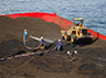 Cooling and spreading of coal on additional barges (for safety reasons) prior to loading coal